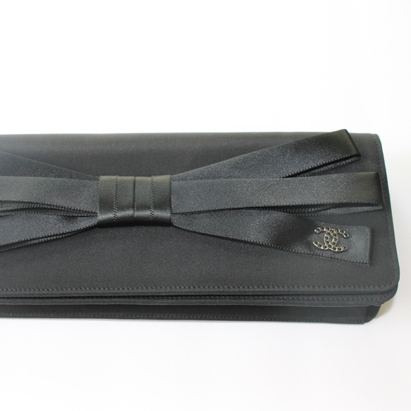CHANEL Handbags - CHANEL Black Satin Bow Silver CC Logo Clutch Bag